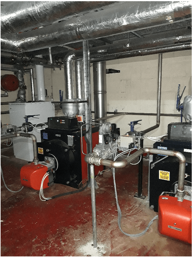 Room with biogas boilers and pipework