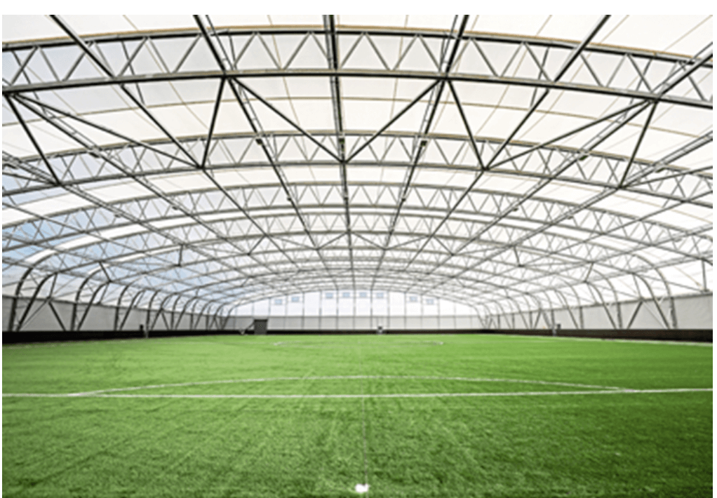 A large indoor football field