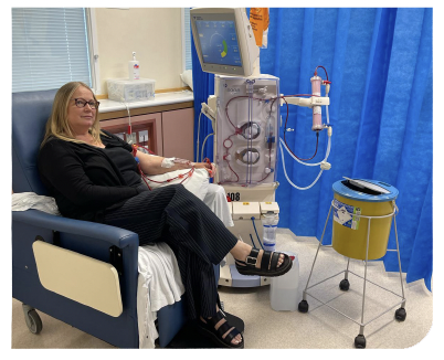 Case study: A patient sitting down in a hospital setting receiving dialysis